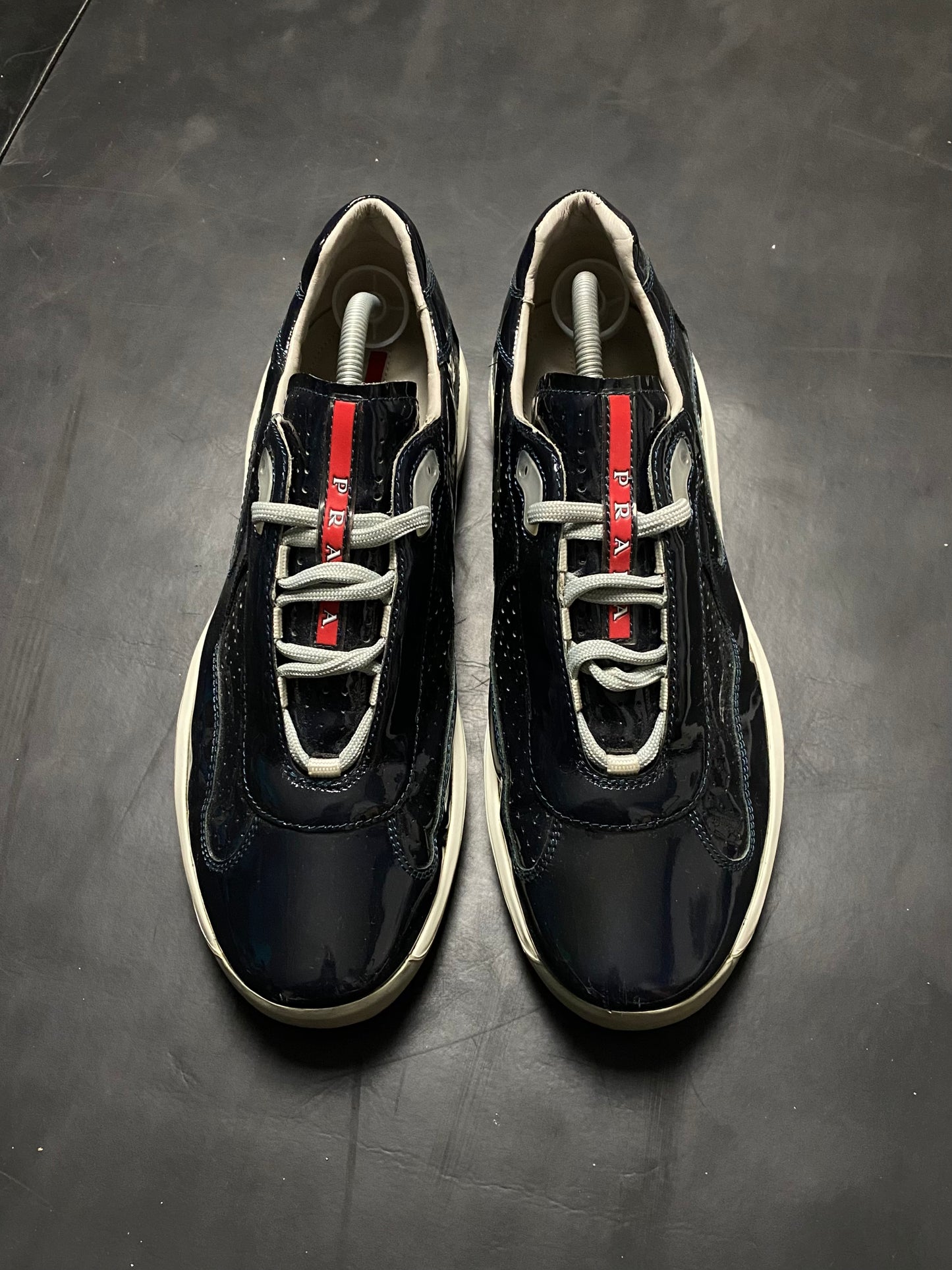 Prada Americas Cup Perforated Patent Trainers