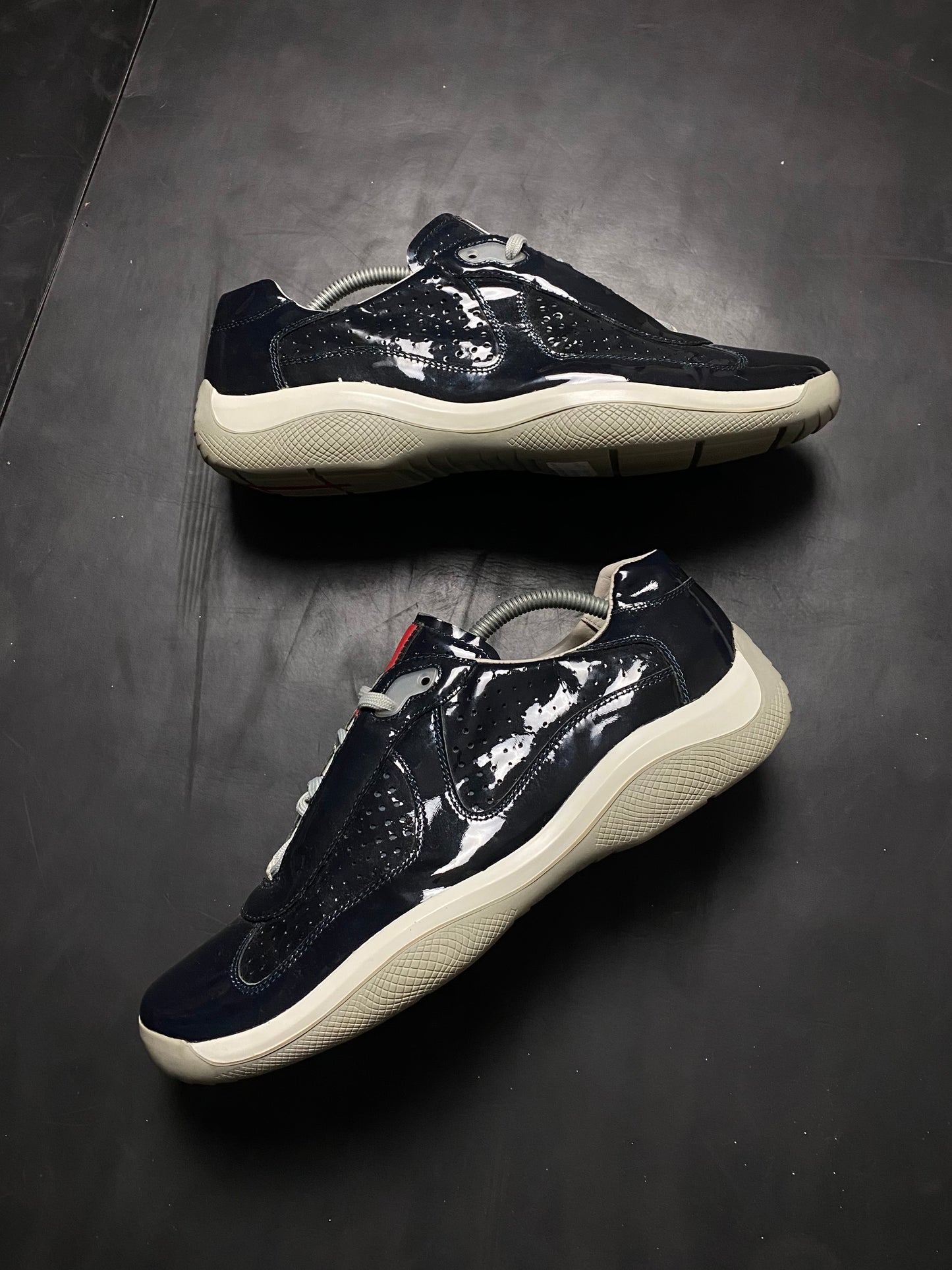 Prada Americas Cup Perforated Patent Trainers