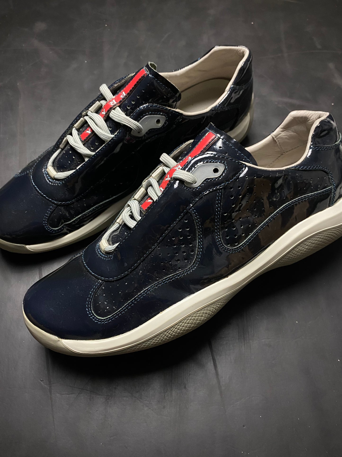 Prada Americas Cup Perforated Patent Trainers