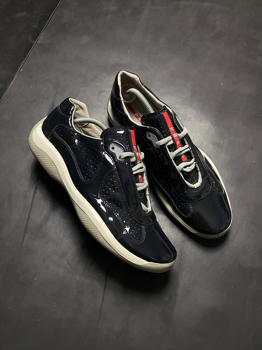 Prada Americas Cup Perforated Patent Trainers