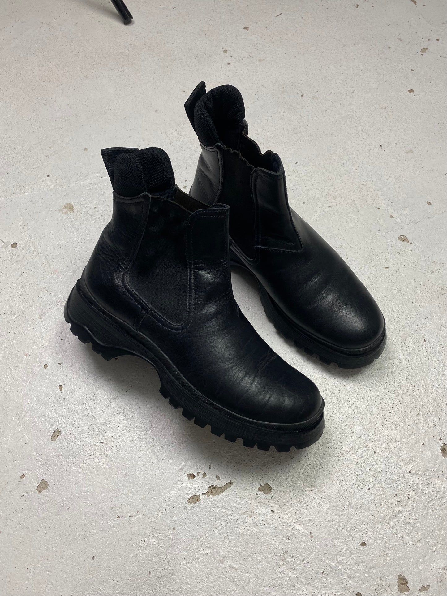 Prada lug sole ankle top boots